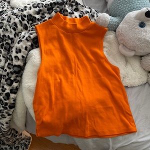 orange turtleneck tank top in size large